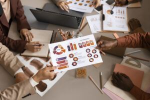 A team collaborating with a fractional CMO to drive business growth.